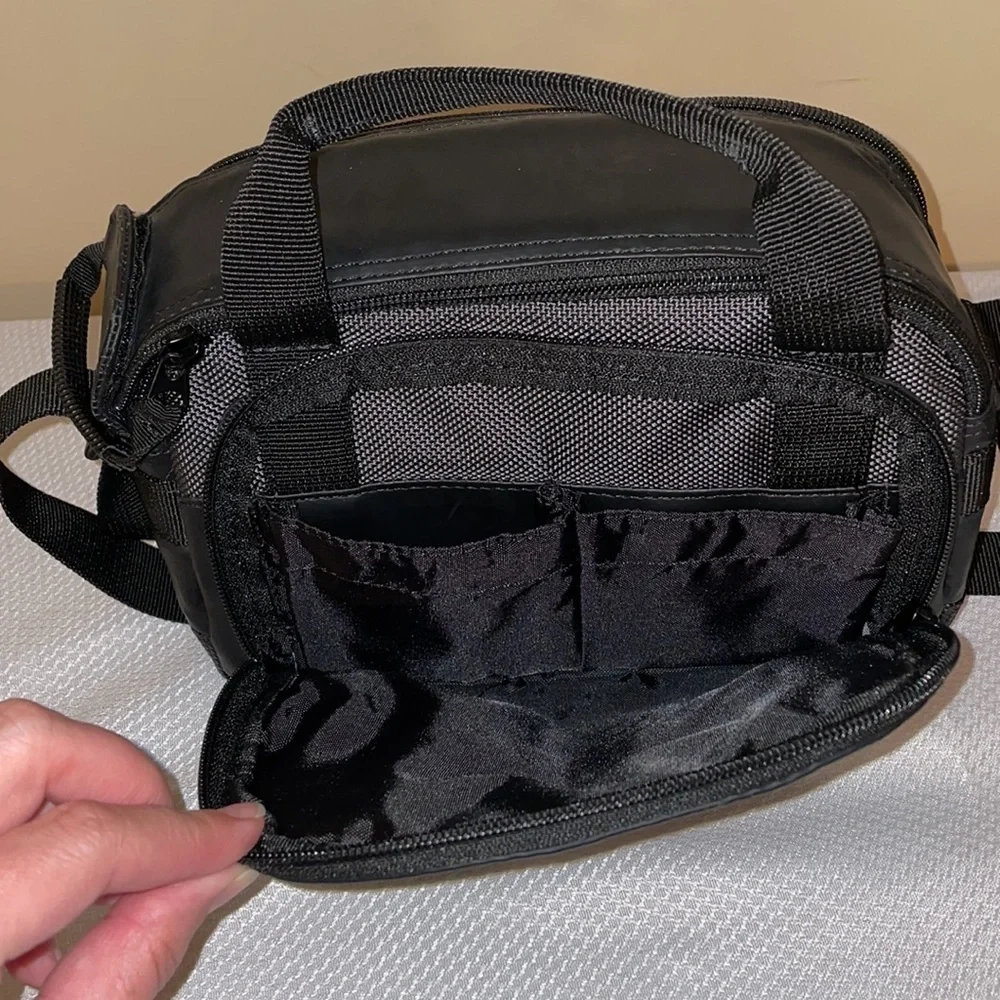 Canon camera bag black carrying case travel padded zipper pockets strap handle